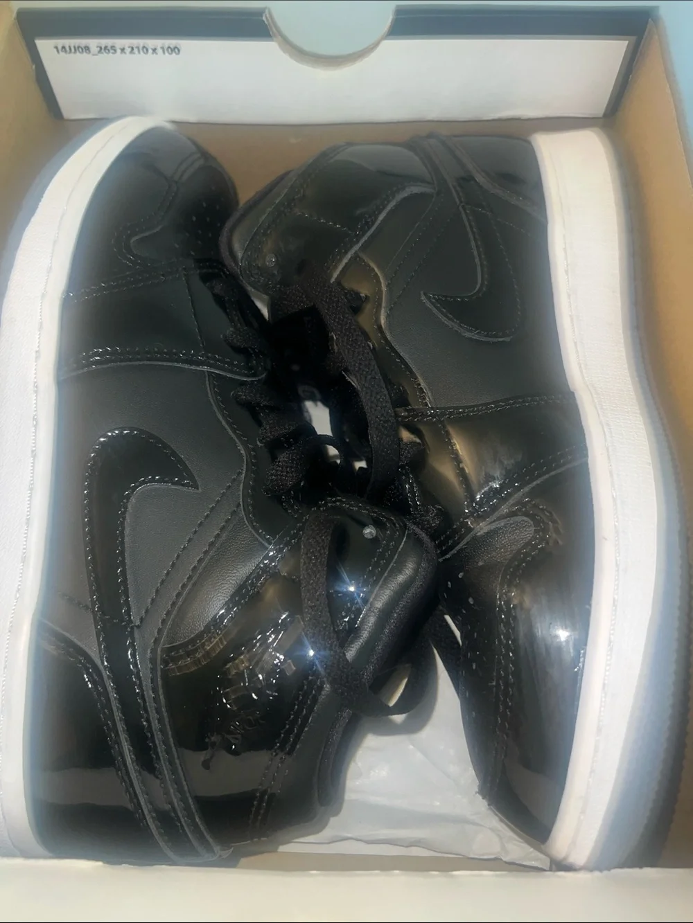 Jordan Black High-Top Sneakers with White Sole